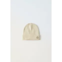 шапка Zara молочна